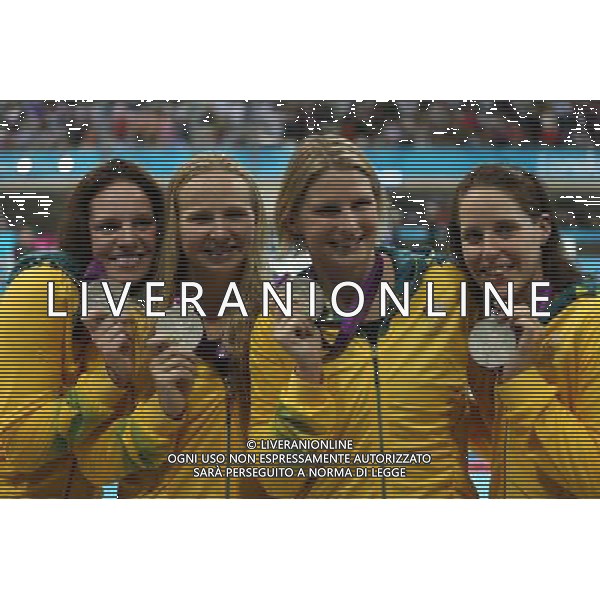 (120804) -- LONDON, Aug. 4, 2012 () -- Members of the Australian team pose during victory ceremony of women\'s swiming 4x100m medley relay competition, at London 2012 Olympic Games in London, Britain, on August 4, 2012. The Australian team won silver medal. (/Fei Maohua) (nxl) ©PHOTOSHOT/Agenzia Aldo Liverani Sas - ITALY ONLY - GIOCHI OLIMPICI, OLIMPIADI LONDRA 2012