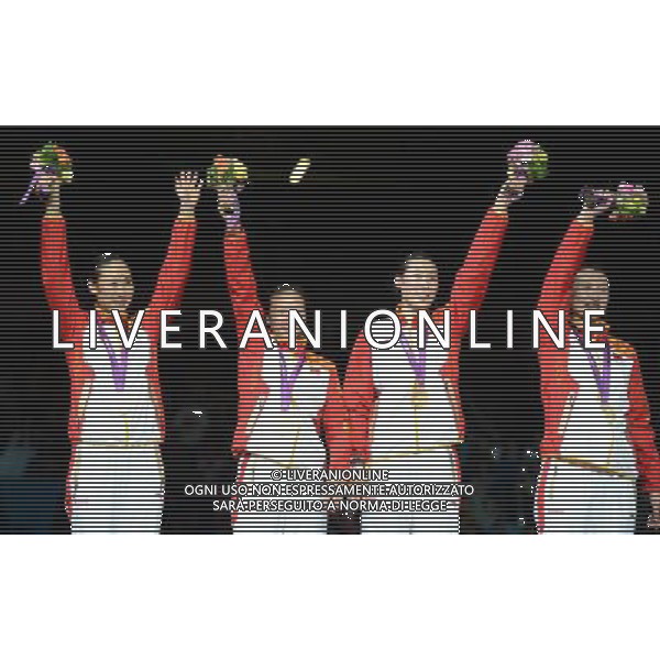 (120804) -- LONDON, Aug. 4, 2012 () -- Members of the Chinese team celebrate after winning in women\'s team epee competition, at London 2012 Olympic Games, London, Britain, Aug. 4, 2012. The Chinese team won gold medal. (/Wu Xiaoling) ©PHOTOSHOT/Agenzia Aldo Liverani Sas - ITALY ONLY - GIOCHI OLIMPICI, OLIMPIADI LONDRA 2012