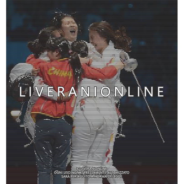 (120804) -- LONDON, Aug. 4, 2012 () -- Members of the Chinese team celebrate after winning in women\'s team epee competition, at London 2012 Olympic Games, London, Britain, Aug. 4, 2012. The Chinese team won gold medal. (/Wu Xiaoling) ©PHOTOSHOT/Agenzia Aldo Liverani Sas - ITALY ONLY - GIOCHI OLIMPICI, OLIMPIADI LONDRA 2012