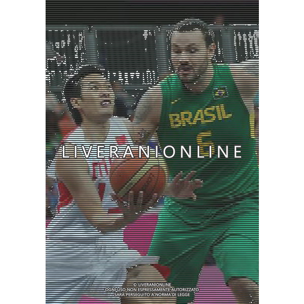 (120804) -- LONDON, Aug. 4, 2012 () -- Players compete during men\'s basketball preliminary round group B match between China and Brazil, at London 2012 Olympic Games in London, Britain, on August 4, 2012. Brazil won 98-59. (/Meng Yongmin) (nxl) ©PHOTOSHOT/Agenzia Aldo Liverani Sas - ITALY ONLY - GIOCHI OLIMPICI, OLIMPIADI LONDRA 2012