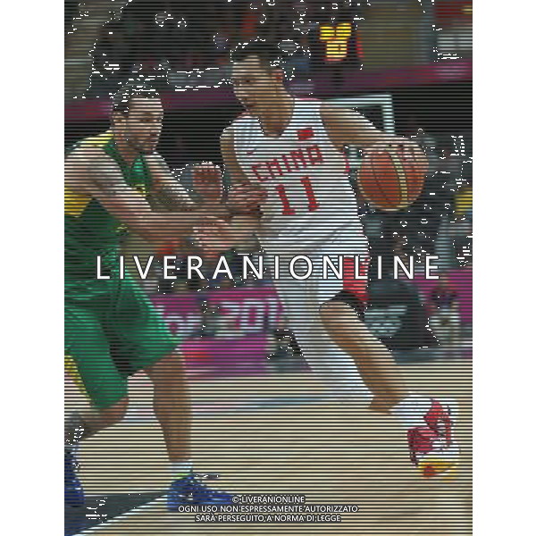 (120804) -- LONDON, Aug. 4, 2012 () -- Yi Jianlian of China (in white) competes during men\'s basketball preliminary round group B match between China and Brazil, at London 2012 Olympic Games in London, Britain, on August 4, 2012. Brazil won 98-59. (/Meng Yongmin) (nxl) ©PHOTOSHOT/Agenzia Aldo Liverani Sas - ITALY ONLY - GIOCHI OLIMPICI, OLIMPIADI LONDRA 2012