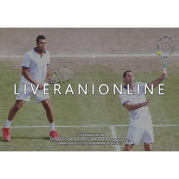 (120804) -- LONDON, Aug. 4, 2012 () -- Michael Llodra and Jo-Wilfried Tsonga of France compete during men\'s tennis doubles gold medal contest, at London 2012 Olympic Games in London, Britain, on August 4, 2012. Michael Llodra and Jo-Wilfried Tsonga of France lost to Mike Bryan and Bob Bryan of USA. (/Chen Jianli) (nxl) ©PHOTOSHOT/Agenzia Aldo Liverani Sas - ITALY ONLY - GIOCHI OLIMPICI, OLIMPIADI LONDRA 2012