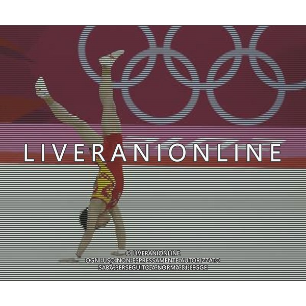 (120805) -- LONDON, Aug. 5, 2012 () -- Zou Kai of China competes during men\'s floor exercise final contest of gymnastics artistic event, at London 2012 Olympic Games in London, Britain, on August 5, 2012. Zou Kai of China won gold medal. (/Shen Bohan) (nxl) /PHOTOSHOT/AG ALDO LIVERANI SAS - ITALY ONLY -