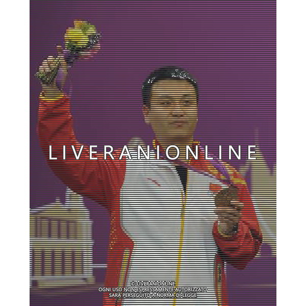 (120805) -- LONDON, Aug. 5, 2012 () -- China\'s Wang Zhiwei poses at awarding ceremony of men\'s 50m pistol of shooting, at London 2012 Olympic Games in London, Britain, August 5, 2012. Jin Jongoh won gold medal. Wang Zhiwei won bronze medal in this event. (/Wang Yuguo) (zgp) /PHOTOSHOT/AG ALDO LIVERANI SAS - ITALY ONLY -