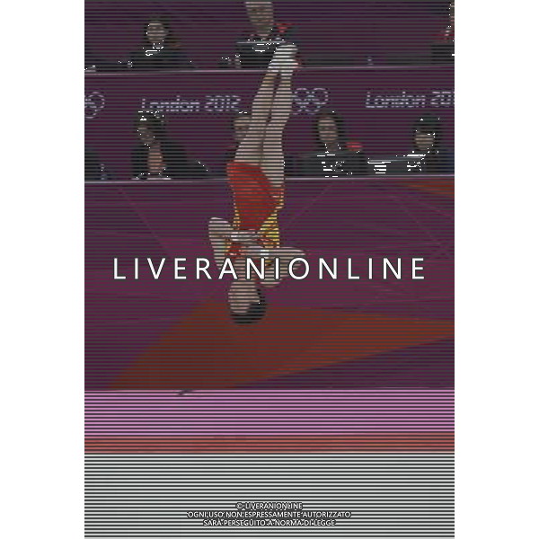 (120805) -- LONDON, Aug. 5, 2012 () -- Zou Kai of China competes during men\'s floor exercise final contest of gymnastics artistic event, at London 2012 Olympic Games in London, Britain, on August 5, 2012. Zou Kai of China won gold medal. (/Qi Heng) (nxl) /PHOTOSHOT/AG ALDO LIVERANI SAS - ITALY ONLY -
