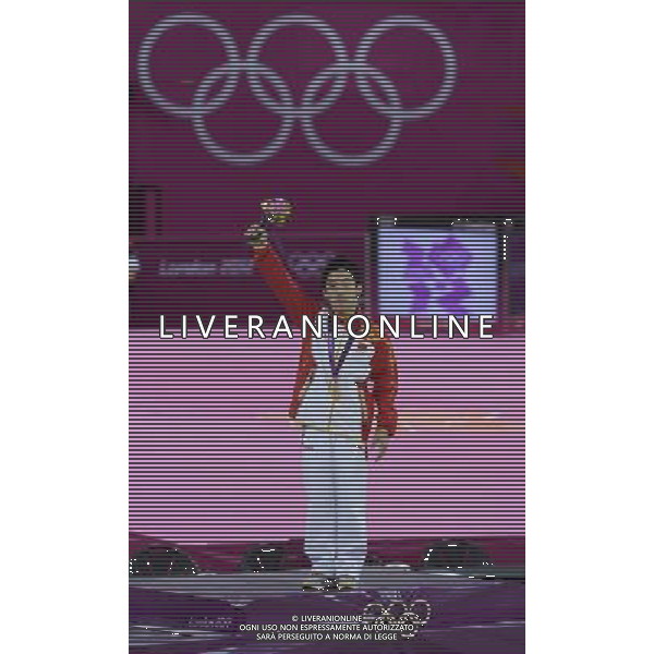 (120805) -- LONDON, Aug. 5, 2012 () -- Gold medalist Zou Kai of China poses during victory ceremony of men\'s floor exercise contest of gymnastics artistic event, at London 2012 Olympic Games in London, Britain, on August 5, 2012. (/Qi Heng) (nxl) /PHOTOSHOT/AG ALDO LIVERANI SAS - ITALY ONLY -