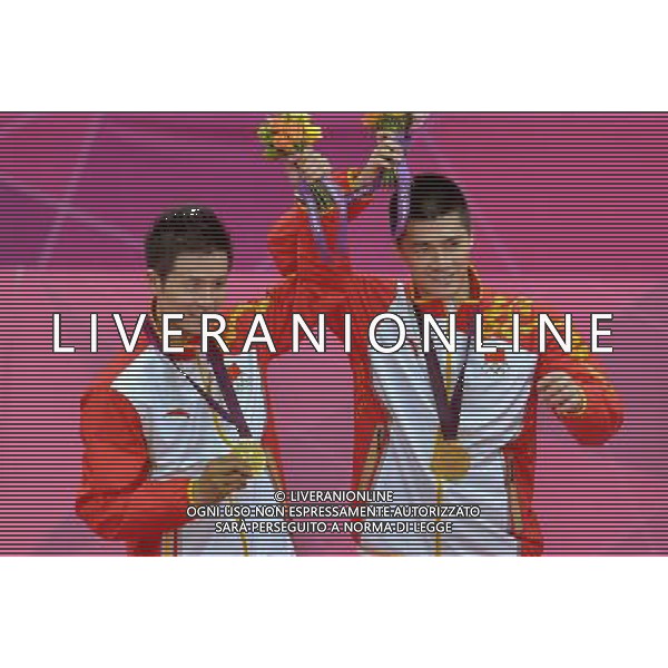 (120805) -- LONDON, Aug. 5, 2012 () -- Gold medalists China\'s Fu Haifeng (R)/Cai Yun pose at awarding ceremony of men\'s badminton doubles, at London 2012 Olympic Games in London, Britain, August 5, 2012. (/Chen Xiaowei) (zgp) /PHOTOSHOT/AG ALDO LIVERANI SAS - ITALY ONLY -