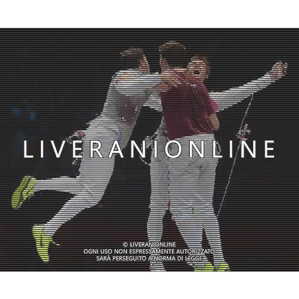 (120805) -- LONDON, Aug. 5, 2012 () -- Members of the Italian team celebrate after winning in men\'s fencing foil team gold medal contest, at London 2012 Olympic Games in London, Britain, on August 5, 2012. Italy defeated Japan. (/Wu Xiaoling) (nxl) /PHOTOSHOT/AG ALDO LIVERANI SAS - ITALY ONLY -