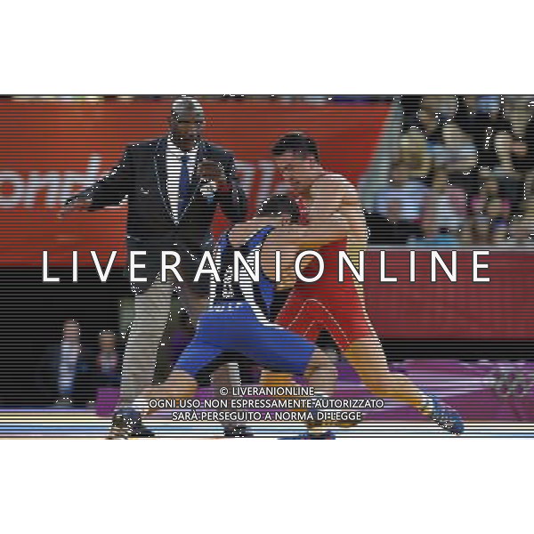 (120805) -- LONDON, Aug. 5, 2012 () -- Roman Vlasov of Russia (red) competes with Arsen Julfalakyan of Armenia during the men\'s wrestling greco-roman 74kg gold medal contest, at London 2012 Olympic Games in London, Britain, on August 5, 2012. Roman Vlasov of Russia won the gold medal of the event. (/Gesang Dawa) /PHOTOSHOT/AG ALDO LIVERANI SAS - ITALY ONLY -
