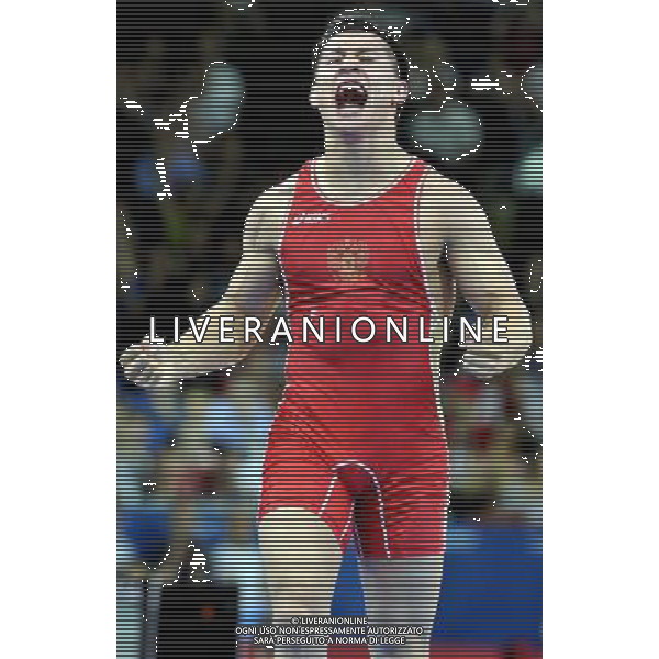 (120805) -- LONDON, Aug. 5, 2012 () -- Roman Vlasov of Russia (red) celebrates after defeating Arsen Julfalakyan of Armenia during the men\'s wrestling greco-roman 74kg gold medal contest, at London 2012 Olympic Games in London, Britain, on August 5, 2012. Roman Vlasov of Russia won the gold medal of the event. (/Gesang Dawa) /PHOTOSHOT/AG ALDO LIVERANI SAS - ITALY ONLY -