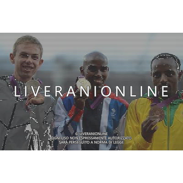 (120805) -- LONDON, Aug. 5, 2012 () -- Gold medalist Mohamed Farah of Britain (C), silver medalist Galen Rupp of USA (L) and bronze medalist Tariku Bekele of Ethiopia attend victory ceremony of men\'s 10,000m contest, at London 2012 Olympic Games in London, Britain, on August 5, 2012. (/Yang Lei) (nxl) /PHOTOSHOT/AG ALDO LIVERANI SAS - ITALY ONLY -