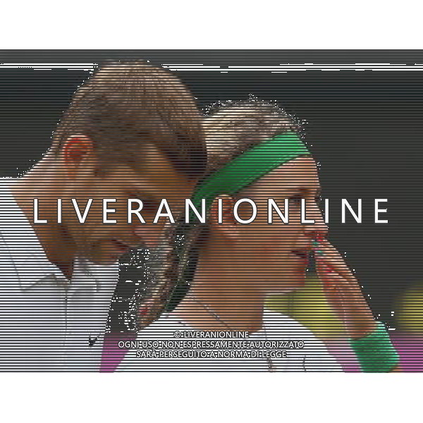 (120805) -- LONDON, Aug. 5, 2012 () -- Victoria Azarenka (R)/Max Mirnyi of Belarus compete during mixed doubles gold medal match of tennis against Laura Robson/Andy Murray of Britain, at London 2012 Olympic Games in London, Britain, on August 5, 2012. Victoria Azarenka/Max Mirnyi of Belarus won the match and won gold medal. (/Chen Jianli) (zgp) /PHOTOSHOT/AG ALDO LIVERANI SAS - ITALY ONLY -