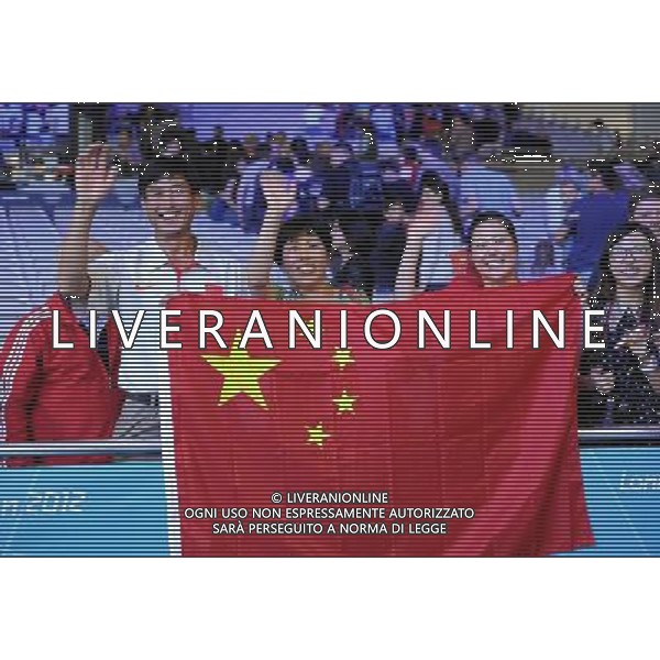 (120805) -- LONDON, Aug. 5, 2012 () -- Zhou Lulu\'s parents cheer for Zhou during women\'s +75kg weightlifting competition, at London 2012 Olympic Games in London, Britain, on August 5, 2012. China\'s Zhou Lulu claimed title in this event. (/Liu Dawei) (zgp) /PHOTOSHOT/AG ALDO LIVERANI SAS - ITALY ONLY -