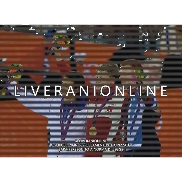 (120805) -- LONDON, Aug. 5, 2012 () -- Gold medalist Lasse Norman Hansen of Denmark (C), silver medalist Bryan Coquard of France (L), and brone medalist Edward Clancy of Britain celebrate at the awarding ceremony of men\'s omnium match of Cycling Track at London 2012 Olympic Games, London, Britain, Aug. 5, 2012. (/Wang Jianhua) /PHOTOSHOT/AG ALDO LIVERANI SAS - ITALY ONLY -