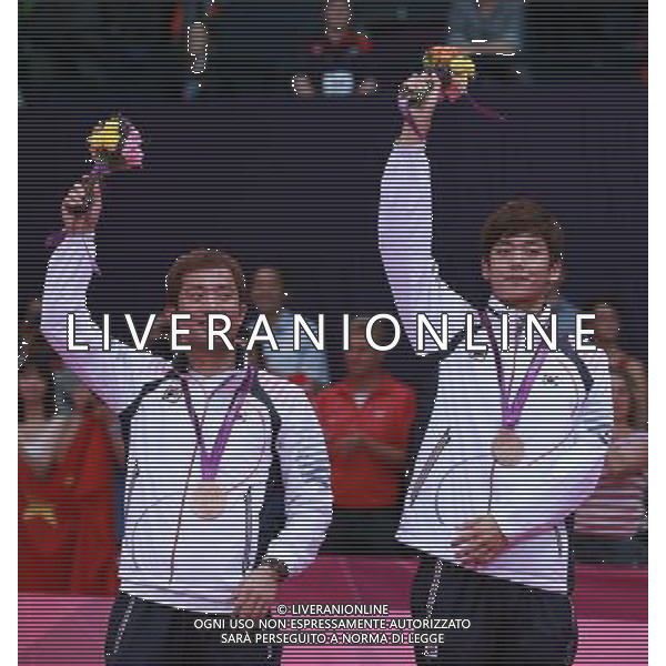 (120805) -- LONDON, Aug. 5, 2012 () -- Bronze medalists Chung Jae Sung/Lee Yong Dae of South Korea pose at awarding ceremony of men\'s badminton doubles, at London 2012 Olympic Games in London, Britain, August 5, 2012. China\'s Fu Haifeng/Cai Yun won gold medal. (/Ren Zhenglai) (zgp) /PHOTOSHOT/AG ALDO LIVERANI SAS - ITALY ONLY -
