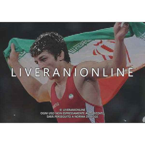 (120805) -- LONDON, Aug. 5, 2012 () -- Hamid Mohammad Soryan Reihanpour of Iran celebrates after winning in men\'s wrestling greco-roman 55kg gold medal contset, at London 2012 Olympic Games in London, Britain, on August 5, 2012. Hamid Mohammad Soryan Reihanpour of Iran won gold medal. (/Li Gang) (nxl) /PHOTOSHOT/AG ALDO LIVERANI SAS - ITALY ONLY -