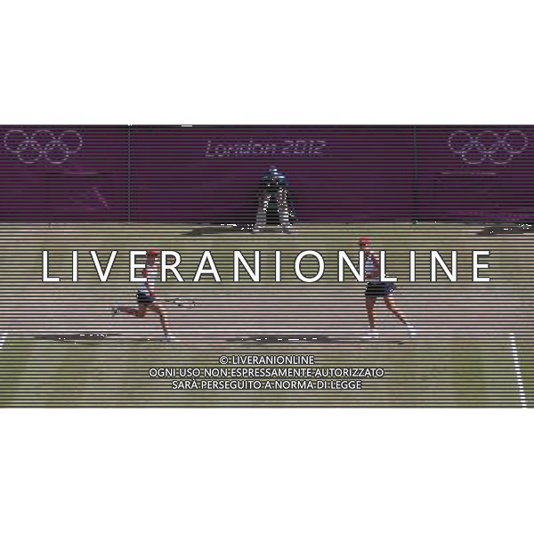(120805) -- LONDON, Aug. 5, 2012 () -- Liezel Huber and Lisa Raymond of USA compete during women\'s tennis doubles bronze medal match, at London 2012 Olympic Games in London, Britain, on August 5, 2012. Maria Kirilenko and Nadia Petrova of Russia defeated Liezel Huber and Lisa Raymond of USA 2-1. (/Yin Gang) (nxl) /PHOTOSHOT/AG ALDO LIVERANI SAS - ITALY ONLY -