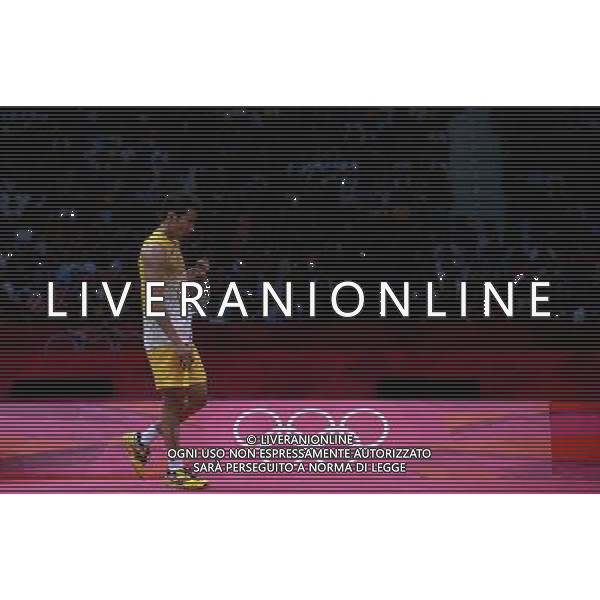 (120805) -- LONDON, Aug. 5, 2012 () -- Lee Chong Wei of Malaysia comeptes during men\'s badminton singles gold medal match against Lin Dan of China, at London 2012 Olympic Games in London, Britain, August 5, 2012. Lee Chong Wei lost the match 1-2 and won silver medal. (/Ren Zhenglai) (zgp) /PHOTOSHOT/AG ALDO LIVERANI SAS - ITALY ONLY -