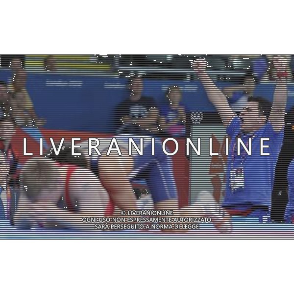 (120805) -- LONDON, Aug. 5, 2012 () -- Iranian coach celebrates as Hamid Mohammad Soryan Reihanpour of Iran competes with Haakan Erik Nyblom of Denmark during men\'s Greco-Roman 55kg wrestling competition, at London 2012 Olympic Games in London, Britain, on August 5, 2012. Hamid Mohammad Soryan Reihanpour won the match 3-0. (/Gesang Dawa) (zgp) /PHOTOSHOT/AG ALDO LIVERANI SAS - ITALY ONLY -