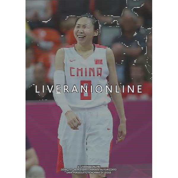 (120805) -- LONDON, Aug. 5, 2012 () -- Miao Lijie of China acts during the basketball women\'s preliminary round Group A match against the United States at London 2012 Olympic Games, London, Britain, Aug. 5, 2012. The United States won the match 114-66. (/Meng Yongmin) /PHOTOSHOT/AG ALDO LIVERANI SAS - ITALY ONLY -