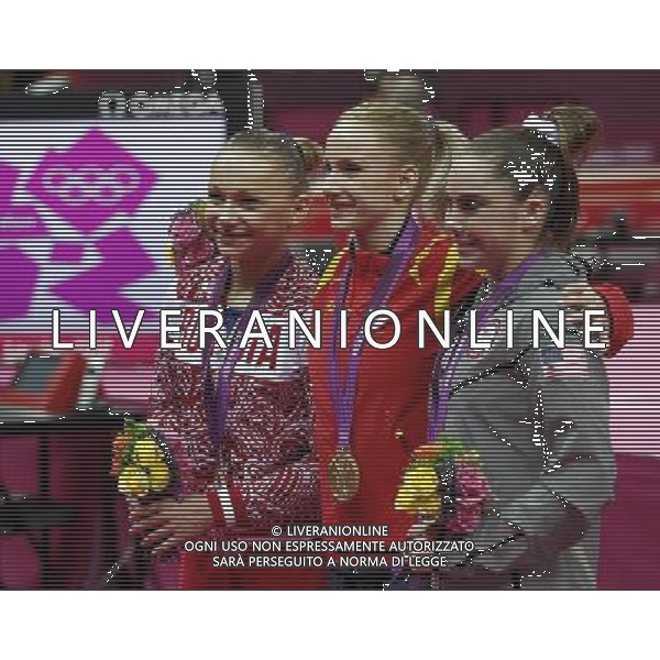 (120805) -- LONDON, Aug. 5, 2012 () -- Gold medalist Sandra Raluca Izbasa of Romania (C), silver medalist Mc Kayla Maroney of USA (R) and bronze medalist Maria Paseka of Russia attend victory ceremony of women\'s vault contest of gymnastics artistic event, at London 2012 Olympic Games in London, Britain, on August 5, 2012. (/shen bohan) (nxl) /PHOTOSHOT/AG ALDO LIVERANI SAS - ITALY ONLY -
