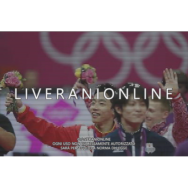(120805) -- LONDON, Aug. 5, 2012 () -- Gold medalist Zou Kao of China (C), silver medalist Kohei Uchimura of Japan (front) and bronze medalist Denis ablyazin of Russia celebrate at the awarding ceremony of men\'s floor exercise of gymnastics artistic event, at London 2012 Olympic Games in London, Britain, on August 5, 2012. (/Shen Bohan) (nxl) /PHOTOSHOT/AG ALDO LIVERANI SAS - ITALY ONLY -