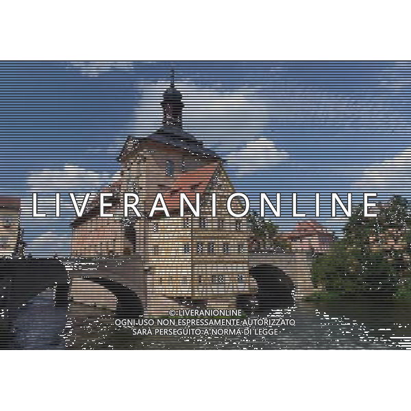 (120805) -- BAMBERG, Aug. 5, 2012 () -- Photo taken on Aug. 4, 2012 shows the former town hall of Bamberg in Bavarian state, Germany. The building, which was built on Regnitz River in 1387, now houses a museum. Bamberg is a UNESCO World Heritage Site. (/Ma Ning) (zw) ©photoshot/AGENZIA ALDO LIVERANI SAS - ITALY ONLY - L\'ex municipio della citta\' bavarese di Bamberg in Germania. L\'edificio, costruito sul Fiume Regnitz nel 1387, oggi ospita un museo, ed e\' patrimonio mondiale dell\'UNESCO.