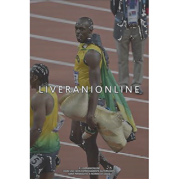 Usain Bolt Jamaica winner of the men\'s 100m final holding London 2012 mascot WenlockC. Olympic Stadium, Olympic Park, Stratford. London AG ALDO LIVERANI S A S ONLY ITALY