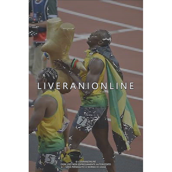 Usain Bolt Jamaica winner of the men\'s 100m final holding London 2012 mascot WenlockC. Olympic Stadium, Olympic Park, Stratford. London AG ALDO LIVERANI S A S ONLY ITALY