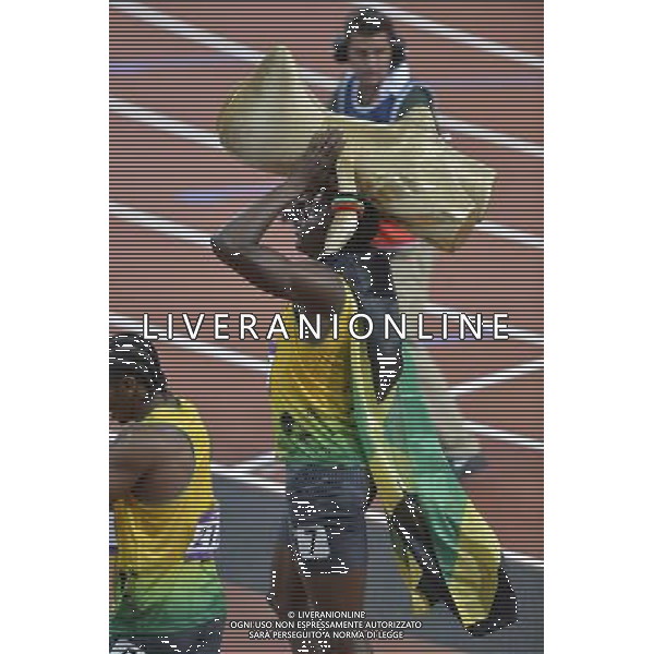 Usain Bolt Jamaica winner of the men\'s 100m final holding London 2012 mascot WenlockC. Olympic Stadium, Olympic Park, Stratford. London AG ALDO LIVERANI S A S ONLY ITALY