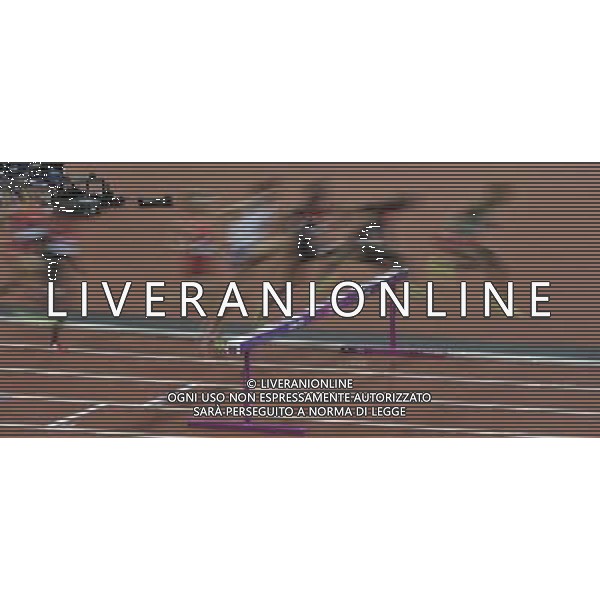 Atletes juming a barrier in the men\'s 3000m steeplechase final. Olympic Stadium, Olympic Park, Stratford. London AG ALDO LIVERANI S A S ONLY ITALY