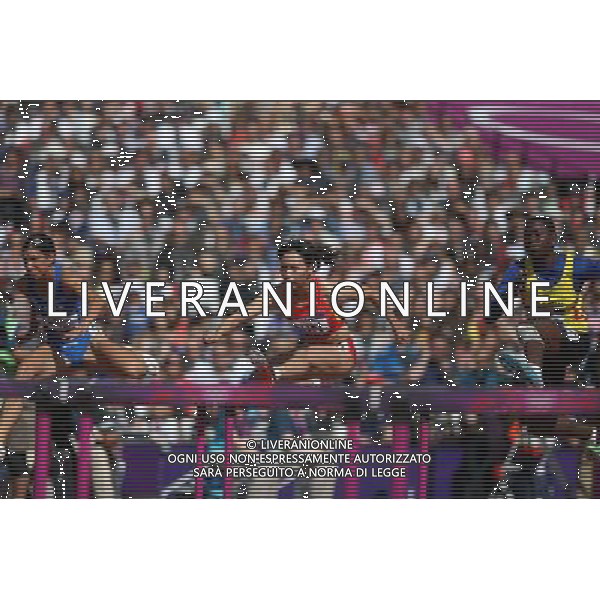 (120806) -- LONDON, Aug. 6, 2012 () -- Sun Yawei (C) of China competes during women\'s 100m hurdles, at London 2012 Olympic Games in London, Britain, on August 6, 2012. Sun was disqualified for next round. (/Liao Yujie) (zgp) AG ALDO LIVERANI S A S ONLY ITALY