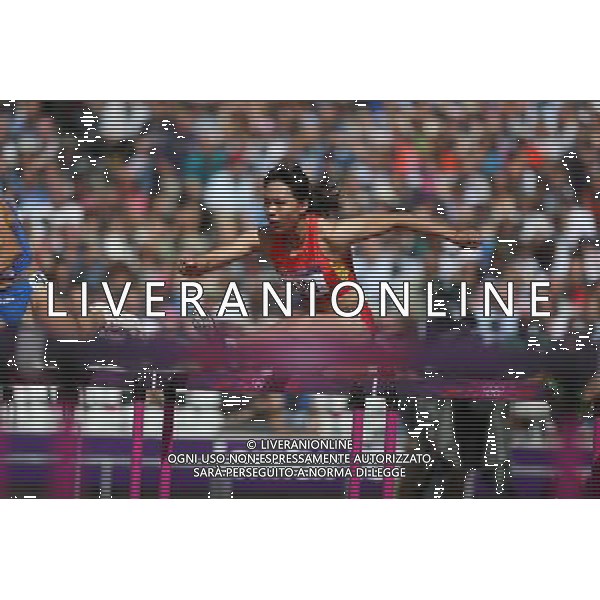 (120806) -- LONDON, Aug. 6, 2012 () -- Sun Yawei of China competes during women\'s 100m hurdles, at London 2012 Olympic Games in London, Britain, on August 6, 2012. Sun was disqualified for next round. (/Liao Yujie) (zgp) AG ALDO LIVERANI S A S ONLY ITALY