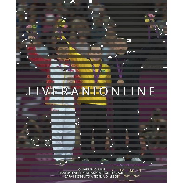 (120806) -- LONDON, Aug. 6, 2012 () -- Gold medalist Arthur Nabarrete Zanetti of Brazil (C), silver medalist Chen Yibing of China (L) and bronze medalist Matteo Morandi of Italy attend victory ceremony of men\'s rings contest of Gymnastics Artistic event, at London 2012 Olympic Games in London, Britain, on August 6, 2012. (/Cheng Min) (nxl) AG ALDO LIVERANI S A S ONLY ITALY