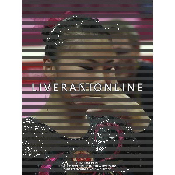 (120806) -- LONDON, Aug. 6, 2012 () -- He Kexin of China reacts during women\'s uneven bars final contest of Gymnastics Artistic event, at London 2012 Olympic Games in London, Britain, on August 6, 2012. He Kexin of China won silver medal. (/Shen Bohan) (nxl) AG ALDO LIVERANI S A S ONLY ITALY