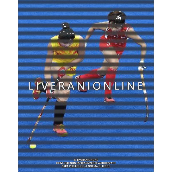 (120806) -- LONDON, Aug. 6, 2012 () -- Players compete during women\'s hockey preliminaries pool WA match between China and Japan, at London 2012 Olympic Games in London, Britain, on August 6, 2012. Japan won 1-0. (/Gesang Dawa) (nxl) AG ALDO LIVERANI S A S ONLY ITALY