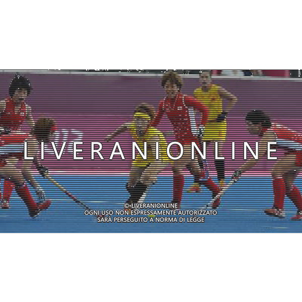 (120806) -- LONDON, Aug. 6, 2012 () -- Players compete during women\'s hockey preliminaries pool WA match between China and Japan, at London 2012 Olympic Games in London, Britain, on August 6, 2012. Japan won 1-0. (/Gesang Dawa) (nxl) AG ALDO LIVERANI S A S ONLY ITALY