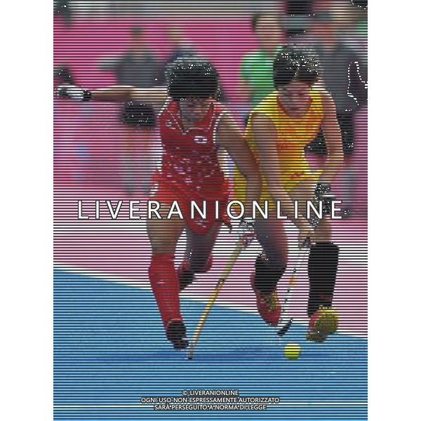 (120806) -- LONDON, Aug. 6, 2012 () -- Players compete during women\'s hockey preliminaries pool WA match between China and Japan, at London 2012 Olympic Games in London, Britain, on August 6, 2012. Japan won 1-0. (/Gesang Dawa) (nxl) AG ALDO LIVERANI S A S ONLY ITALY
