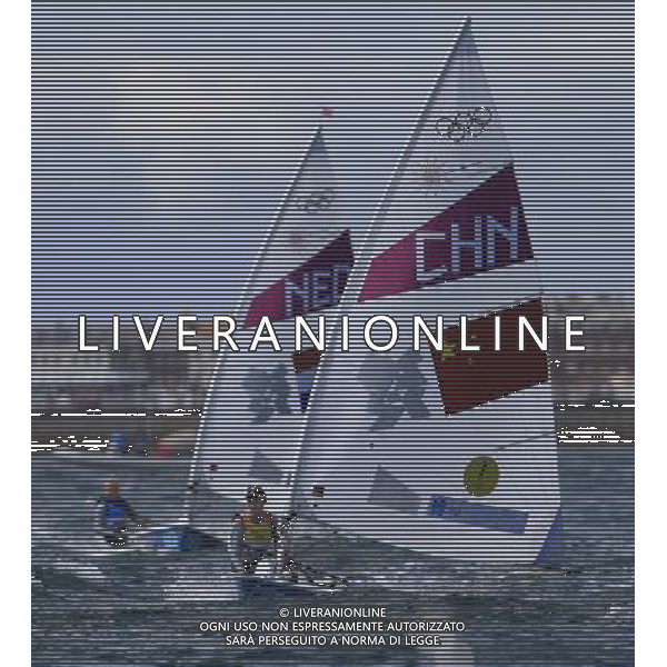 (120806) -- LONDON, Aug. 6, 2012 () -- China\'s Xu Lijia (front) competes during women\'s laser radial race of sailing event, at London 2012 Olympic Games, London, Britain, Aug. 6, 2012. China\'s Xu Lijia won gold medal. (/Ren Zhenglai)(zgp) AG ALDO LIVERANI S A S ONLY ITALY