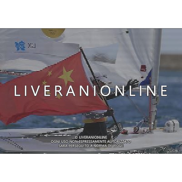 (120806) -- LONDON, Aug. 6, 2012 () -- China\'s Xu Lijia celebrates after winning women\'s laser radial race of sailing event, at London 2012 Olympic Games, London, Britain, Aug. 6, 2012. China\'s Xu Lijia won gold medal. (/Ren Zhenglai)(zgp) AG ALDO LIVERANI S A S ONLY ITALY