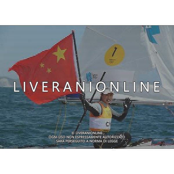 (120806) -- LONDON, Aug. 6, 2012 () -- China\'s Xu Lijia celebrates after winning women\'s laser radial race of sailing event, at London 2012 Olympic Games, London, Britain, Aug. 6, 2012. China\'s Xu Lijia won gold medal. (/Gong Lei)(zgp) AG ALDO LIVERANI S A S ONLY ITALY