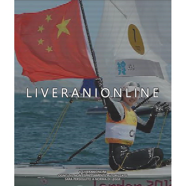 (120806) -- LONDON, Aug. 6, 2012 () -- China\'s Xu Lijia celebrates after winning women\'s laser radial race of sailing event, at London 2012 Olympic Games, London, Britain, Aug. 6, 2012. China\'s Xu Lijia won gold medal. (/Gong Lei)(zgp) AG ALDO LIVERANI S A S ONLY ITALY