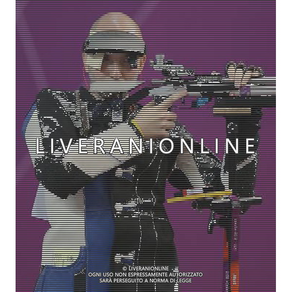 (120806) -- LONDON, Aug. 6, 2012 () -- Niccolo Campriani (L) of Italy competes during men\'s 50m rifle 3 positions final of shooting at London 2012 Olympic Games, London, Britain, Aug. 6, 2012. Niccolo Campriani of Italy won gold medal and set a new Olympic record with 1278.5 in this event. (/Wang Lili)(zgp) AG ALDO LIVERANI S A S ONLY ITALY