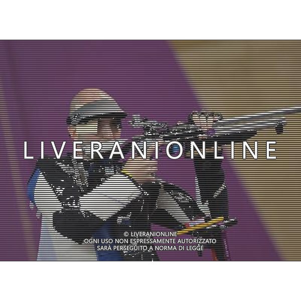 (120806) -- LONDON, Aug. 6, 2012 () -- Niccolo Campriani of Italy competes during men\'s 50m rifle 3 positions final of shooting at London 2012 Olympic Games, London, Britain, Aug. 6, 2012. Niccolo Campriani of Italy won gold medal and set a new Olympic record with 1278.5 in this event. (/Zeng Yi)(zgp) AG ALDO LIVERANI S A S ONLY ITALY