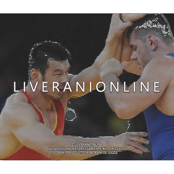 (120806) -- LONDON, Aug. 6, 2012 () -- Liu Deli of China (in red) competes with Mihaly Beak-Bardos of Hungary during men\'s wrestling greco-roman 60kg qualifications contest, at London 2012 Olympic Games in London, Britain, on August 6, 2012. Mihaly Beak-Bardos of Hungary won. (/Li Gang) (nxl) AG ALDO LIVERANI S A S ONLY ITALY