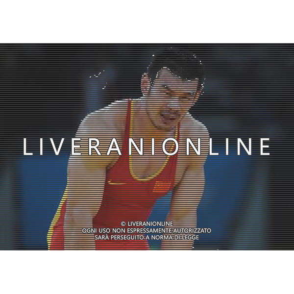 (120806) -- LONDON, Aug. 6, 2012 () -- Liu Deli of China competes with Mihaly Beak-Bardos of Hungary during men\'s wrestling greco-roman 60kg qualifications contest, at London 2012 Olympic Games in London, Britain, on August 6, 2012. Mihaly Beak-Bardos of Hungary won. (/Li Gang) (nxl) AG ALDO LIVERANI S A S ONLY ITALY