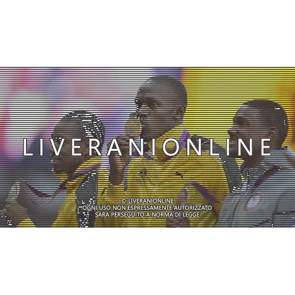 Yohan Blake (Jamaica) silver medalist, Usain Bolt (Jamaica) Gold medalist and Justin Gatlin (USA) Men\'s 100m. Olympic Stadium, Olympic Park, Stratford. London AG ALDO LIVERANI S A S ONLY ITALY