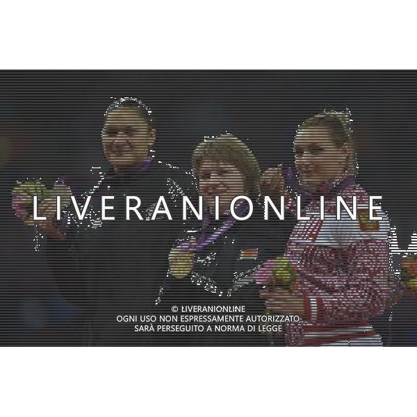 Valerie Adams (New Zealand) Silver medalist, Nadzeya Ostapchuk (Belarus) gold medalist and Evgeniia Kolodko (Russia) Bronze medalist Women\'s Shot Putt. Olympic Stadium, Olympic Park, Stratford. London AG ALDO LIVERANI S A S ONLY ITALY