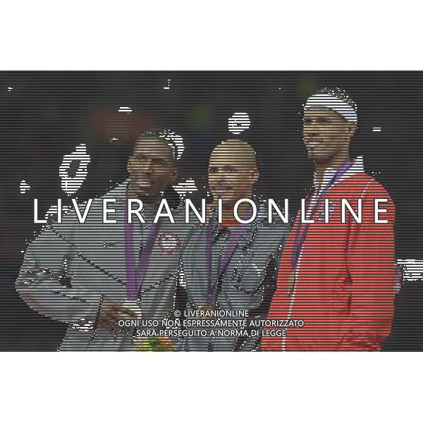 Michael Tinsley (USA) silver medalist, Felix Sanchez (Dominican Republic) Gold medalist and Javier Culson (Puerto Rico) men\'s 400m hurdles. Olympic Stadium, Olympic Park, Stratford. London AG ALDO LIVERANI S A S ONLY ITALY