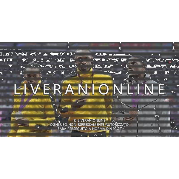 Yohan Blake (Jamaica) silver medalist, Usain Bolt (Jamaica) Gold medalist and Justin Gatlin (USA) bronze medalist Men\'s 100m. Olympic Stadium, Olympic Park, Stratford. London AG ALDO LIVERANI S A S ONLY ITALY
